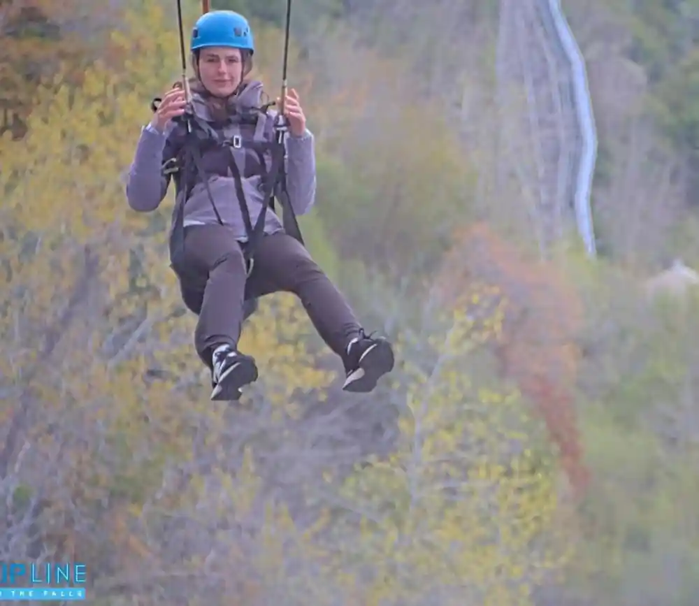 A rider in flight down the line